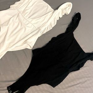 Brand new . Took tags off. Black or white. Deep v in back